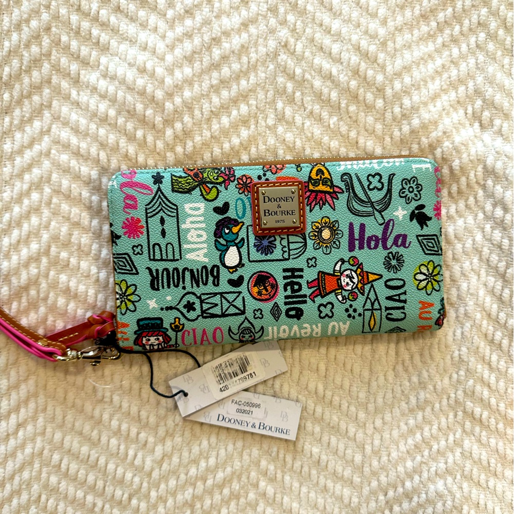 BNWT Disney DOONEY and BOURKE large wallet “it’s a small world “